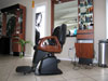 barber chair set inside shop after remodeling